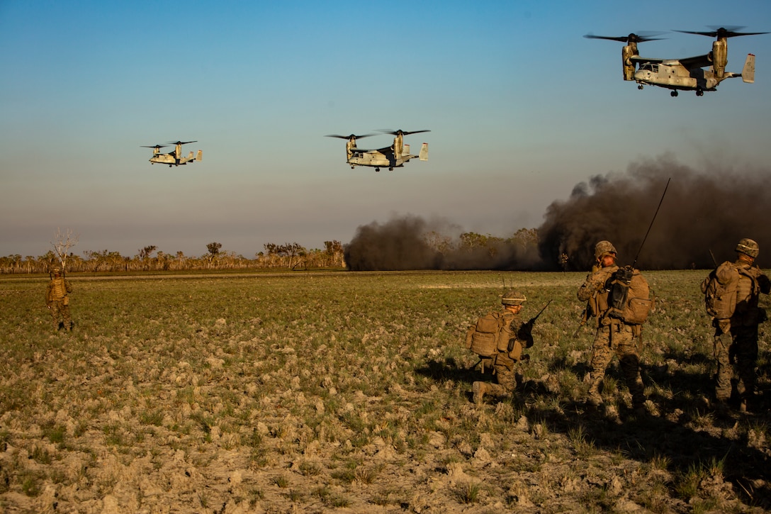 U.S. Marines await to be inserted via MV-22 Ospreys during a company raid in Exercise Koolendong at Mount Bundey Training Area, NT, Australia, Aug. 23.