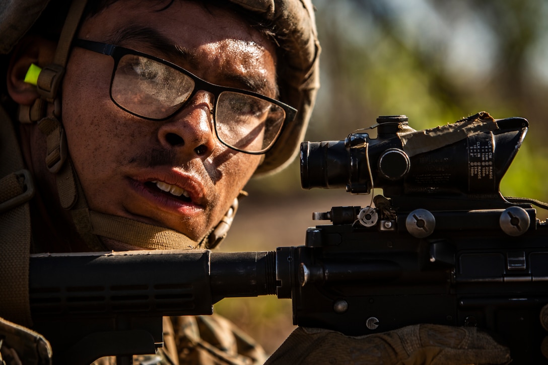 A U.S. Marine provides security during a company raid a part of Exercise Koolendong at Mount Bundey Training Area, NT, Australia, Aug. 22.