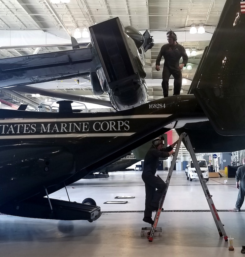 Marines assigned to the Marine Corps Helicopter Squadron One in Quantico, Virginia, perform aircraft maintenance on the MV-22 Osprey with parts provided by DLA Aviation. Marines assigned to the Marine Corps Customer Facing Division, Customer Operations Directorate of DLA Aviation traveled to Quantico in May to provide onsite training to the squadron’s Aviation Supply Department on DLA procurement processes. Courtesy photo