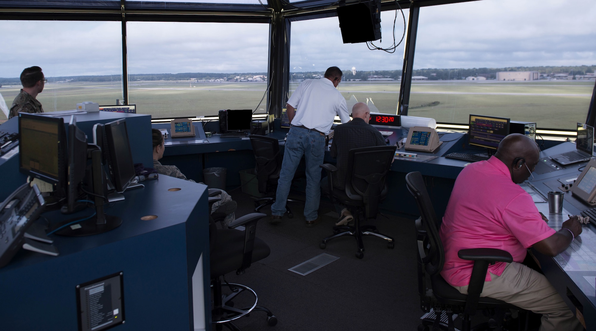 U.S. Airmen and civilians from the 20th Fighter Wing observe the flight of F-16 Vipers before Hurricane Dorian’s arrival at Shaw Air Force Base, South Carolina, Sept. 4, 2019.