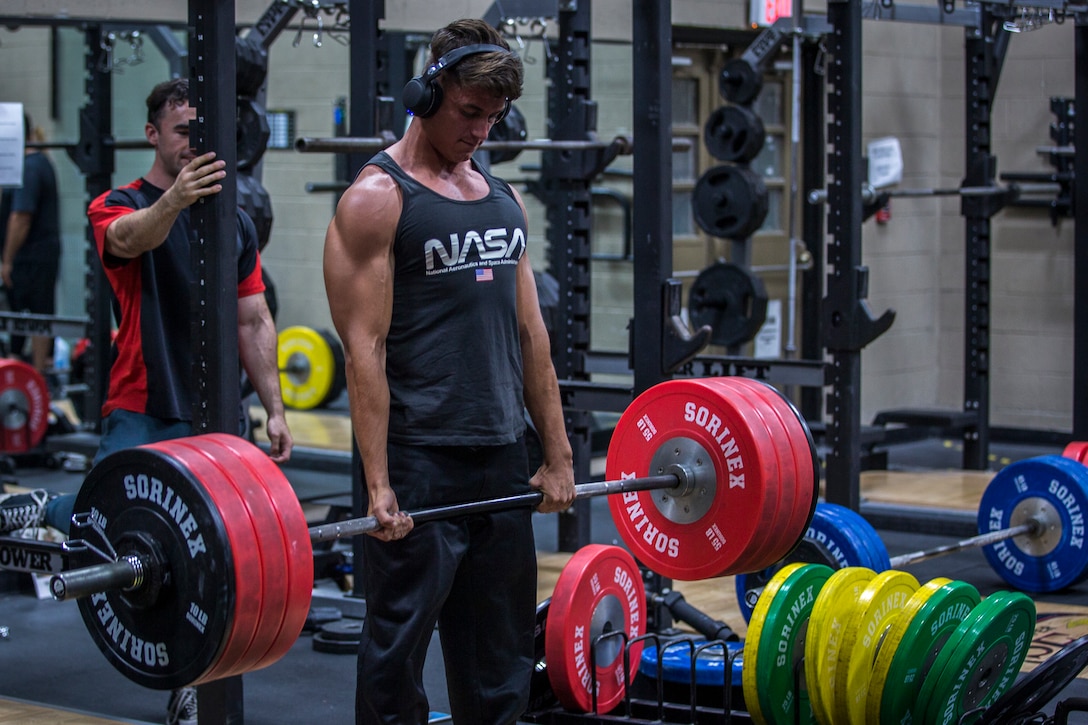 U.S. Marines and civilians aboard Marine Corps Air Station (MCAS) Yuma compete in a weight lifting contest at theMCAS Yuma Station Gym on August 28, 2019. The competition consisted of 3 maximum repititions of squats, bench press, and then deadlifts. (U.S. Marine Corps photo by Lance Cpl. John Hall)