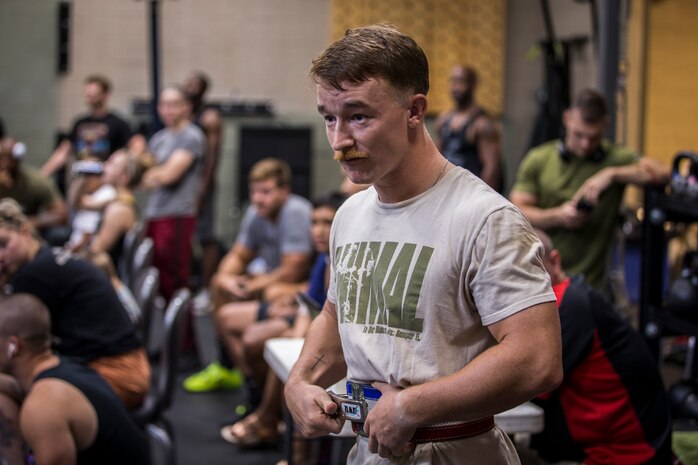 U.S. Marines and civilians aboard Marine Corps Air Station (MCAS) Yuma compete in a weight lifting contest at theMCAS Yuma Station Gym on August 28, 2019. The competition consisted of 3 maximum repititions of squats, bench press, and then deadlifts. (U.S. Marine Corps photo by Lance Cpl. John Hall)