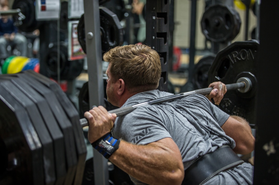 U.S. Marines and civilians aboard Marine Corps Air Station (MCAS) Yuma compete in a weight lifting contest at theMCAS Yuma Station Gym on August 28, 2019. The competition consisted of 3 maximum repititions of squats, bench press, and then deadlifts. (U.S. Marine Corps photo by Lance Cpl. John Hall)