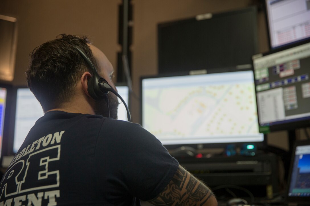 Michael Fila, an emergency dispatcher on Marine Corps Base Camp Pendleton, takes a call in the dispatch center on Camp Pendleton, California, Aug. 26, 2019. Fila was medically separated from the Marine Corps in 2014 due to being diagnosed with multiple sclerosis. He continues to work on Camp Pendleton to give back to the Corps and maintain the brotherhood he feels toward his fellow Marines. (U.S. Marine Corps photo by Lance Cpl. Andrew Cortez)