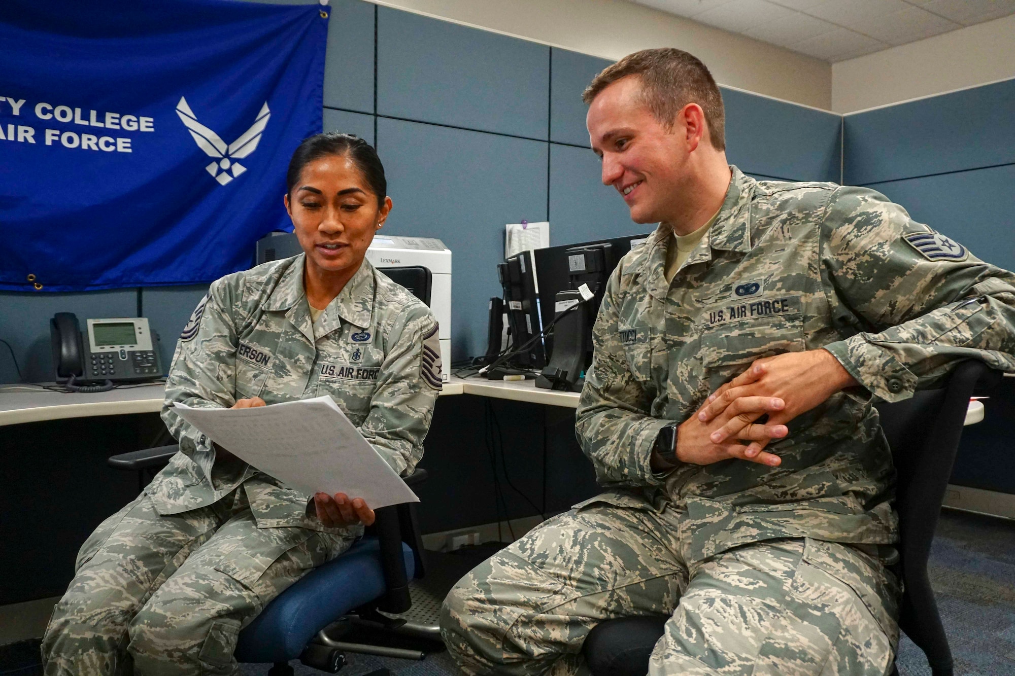 Master Sgt. Michelle Wilkerson, 419th Force Support Squadron, explains education benefits to Staff Sgt. Matthew Mattucci during a unit training assembly weekend at Hill Air Force Base, Utah