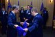 The 355th Dental Squadron guidon is furled as the squadron is deactivated during a reorganization ceremony for the 355th Medical Group at Davis-Monthan Air Force Base, Arizona, Aug. 29, 2019. The squadron was deactivated and the services now align under the new 355th Operational Medical Readiness Squadron. (U.S. Air Force photo by Airman 1st Class Jacob T. Stephens)