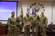 U.S. Air Force Gen. Mike Holmes, commander of Air Combat Command, presents four Guardian Angel Airmen with the 2018 ACC outstanding Pararescuemen awards at Davis-Monthan Air Force Base, Arizona, Aug. 21, 2019. The Airmen are assigned to the 68th Rescue Squadron, Davis-Monthan AFB; the 304th RQS, Portland Air National Guard Base, Oregon; 58th RQS, Nellis AFB, Nevada; and the 720th Special Tactics Group, Hurlburt Field, Florida. (U.S. Air Force photo by Senior Airman Mya M. Crosby)