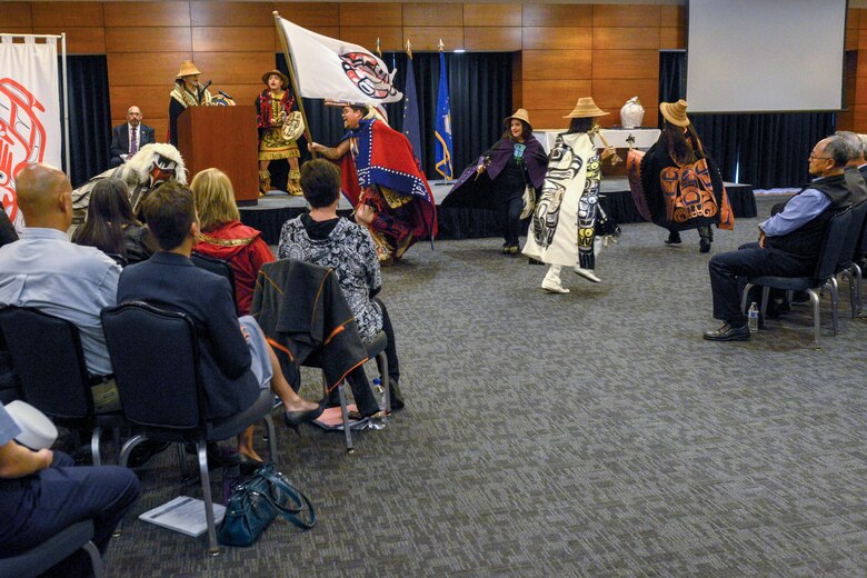 Git Hoan Dancers, a Tsimshian performance group, perform during an Alaska Native naming ceremony for U.S. Air Force Lt. Gen. Thomas Bussiere commander, Alaskan North American Aerospace Defense Command Region, North American Aerospace Defense Command; commander, Alaskan Command, U.S. Northern Command; and commander, 11th Air Force, Pacific Air Forces, on Joint Base Elmendorf-Richardson, Alaska, Aug. 28, 2019. The AFN hosted the event honoring Bussiere for his service and his active engagement with the Alaska Native community during his tenure in Alaska. The naming ceremony is based on the traditional belief that a person’s name is the type of soul they possess. The ceremony showcased the bond between the Alaska Native community and the military in Alaska.
