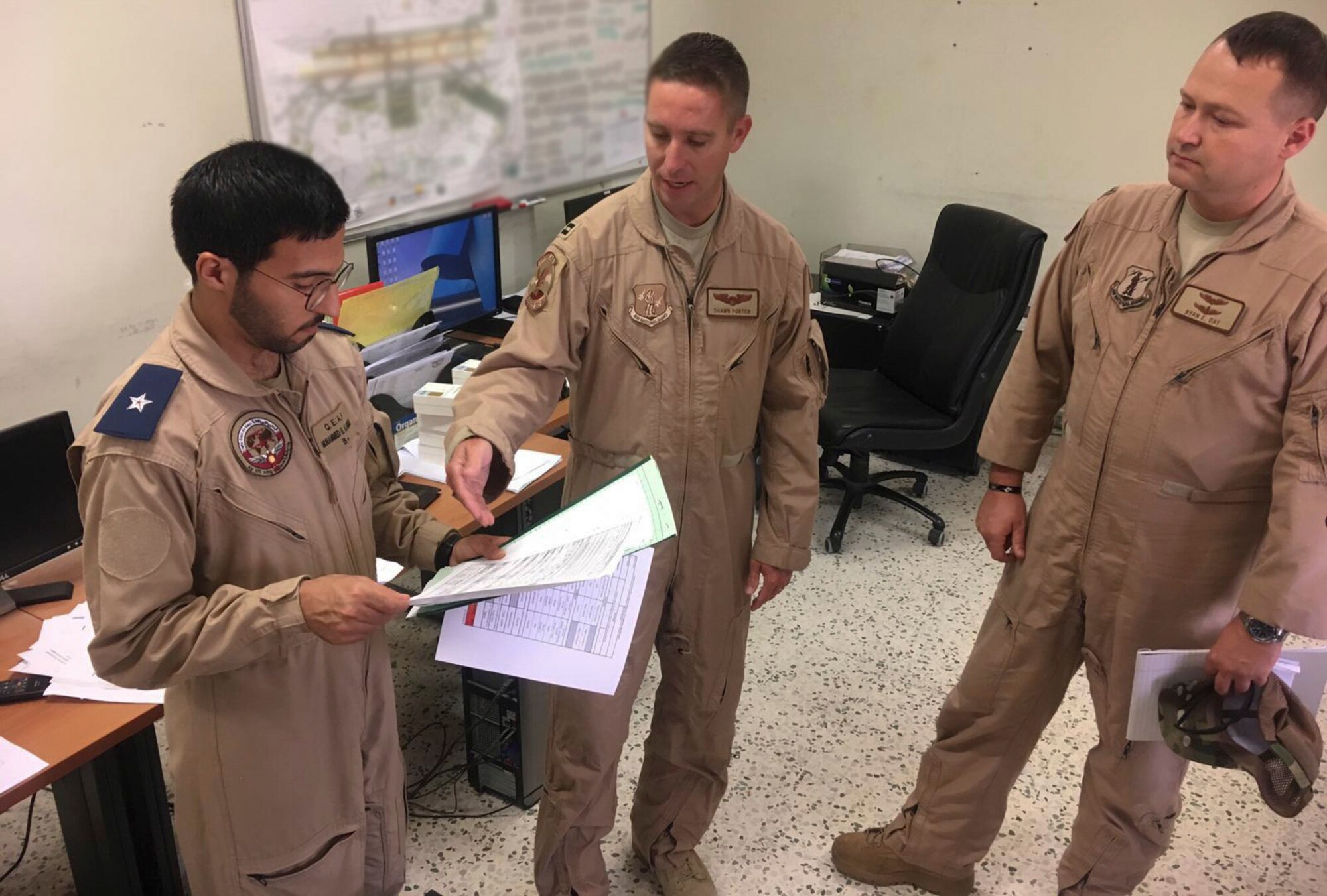 Members of the West Virginia Air National Guard's 130th and 167th Airlift Wing discuss current operations planning and procedures with representatives of the Qatari Emiri Air Force Aug. 17., 2019, at Al Udeid Air Base, Qatar. The subject matter expert exchange was the second WVANG-QEAF partnership meeting to be held since the announcement of the new partnership in May 2018, which marked the second partner nation for the WVNG and the sixth SPP country in the U.S. Central Command area of responsibility for the National Guard. (Courtesy photo)