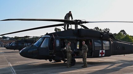 Crew members from the West Virginia National Guard's Company C., 2-104th General Support Aviation Battalion, located in Williamstown, W.Va., prepare to deploy to South Carolina in support of Hurricane Dorian response and recovery operations Sept. 4, 2019. Eight Soldiers from the aeromedical evacuation crew will be on standby for a week to provide assistance as needed. (U.S. Army National Guard photo by Edwin Wriston)