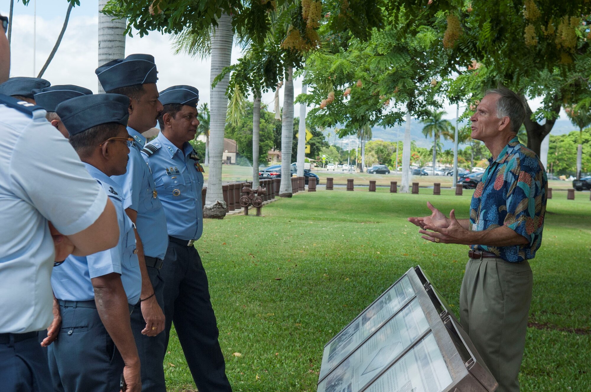 Charles Nicholls, Pacific Air Forces historian, gives a history tour to senior leaders of the Sri Lanka air force at Headquarters PACAF, Joint Base Pearl Harbor-Hickam, Hawaii, Aug. 22, 2019. During the four-day visit, SLAF and U.S. Air Force senior leaders engaged in three different working groups; humanitarian assistance and disaster relief, air and maritime domain awareness, and force development. (U.S. Air Force photo by Staff Sgt. Mikaley Kline)