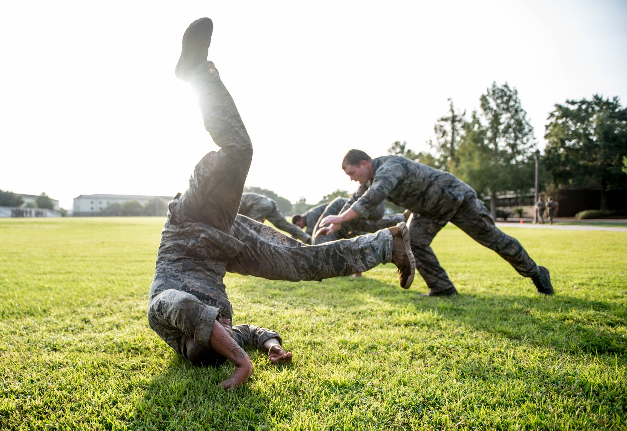 Airmen from the 352nd Special Warfare Training Squadron participate in a memorial physical training session on Keesler Air Force Base, Mississippi, Aug. 9, 2019. The PT event was in memory of U.S. Air Force Staff Sgt. Andrew Harvell, combat controller, killed in action on Aug. 6, 2011. Special Warfare trainees also attend courses in the 334th and 335th Training Squadrons before attending additional training at Pope Air Force Base, North Carolina. (U.S. Air Force photo by Sarah Loicano)