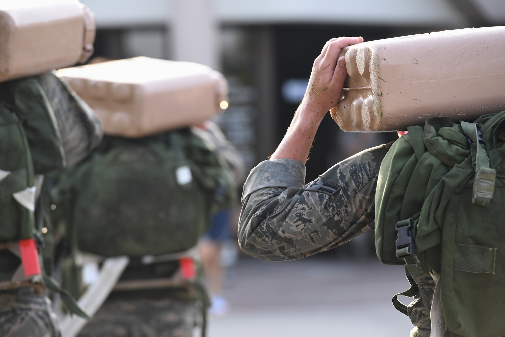 Special Warfare trainees from the 352nd Special Warfare Training Squadron participate in a memorial physical training session outside of Matero Hall on Keesler Air Force Base, Mississippi, Aug. 9, 2019. The PT event was in memory of U.S. Air Force Staff Sgt. Andrew Harvell, combat controller, who was killed in action on Aug. 6, 2011. Special Warfare trainees also attend courses in the 334th and 335th Training Squadrons. (U.S. Air Force photo by Kemberly Groue)