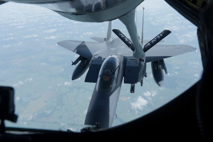 Aircraft refuels in mid-air.