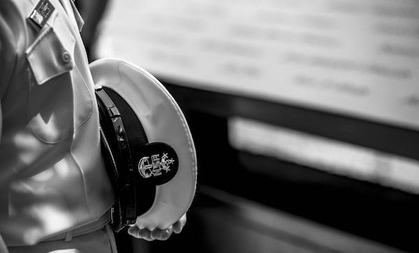 A close up of MCPON's hat at the 9/11 memorial.