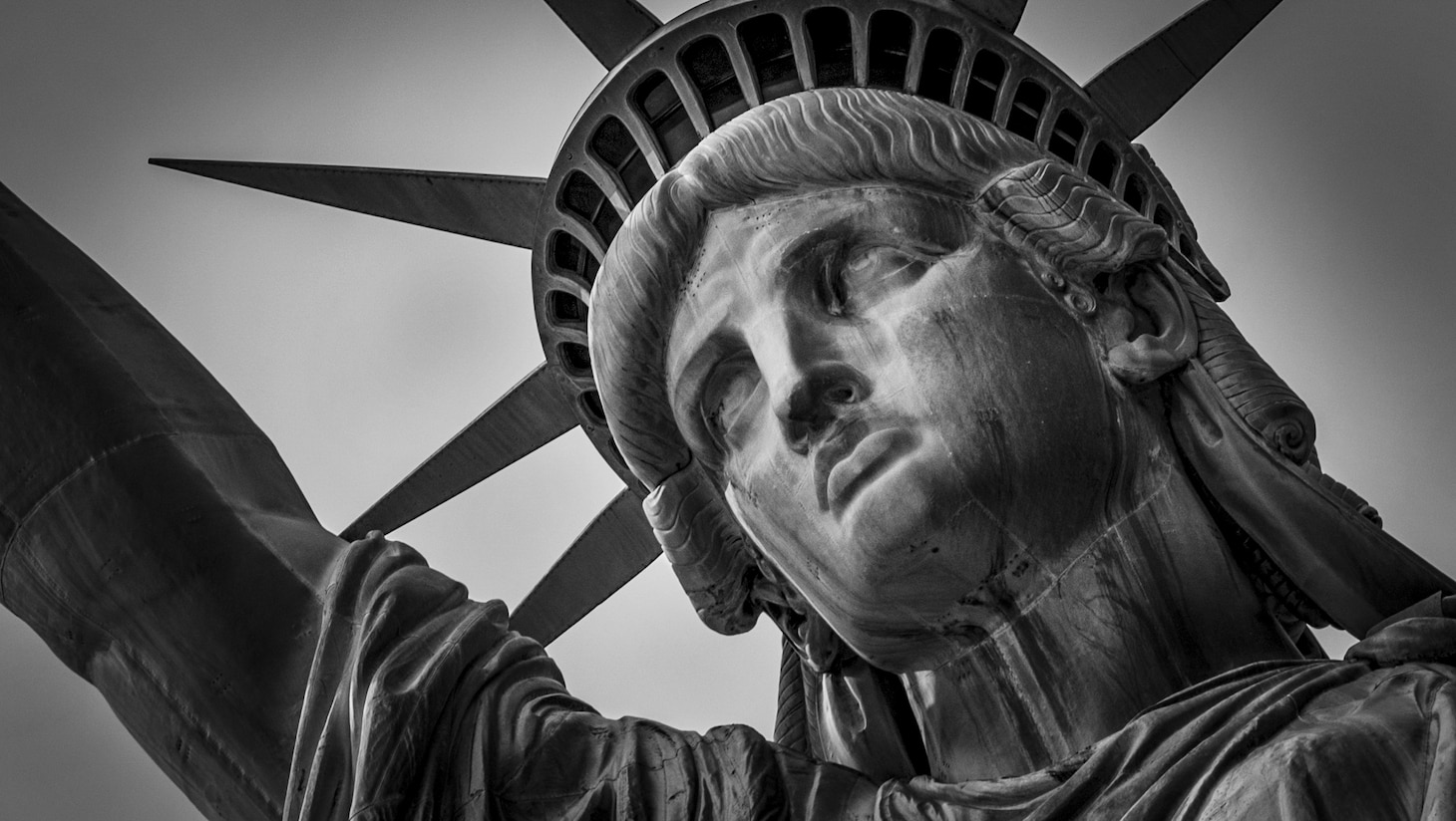 A close up of the statue of liberty's face.