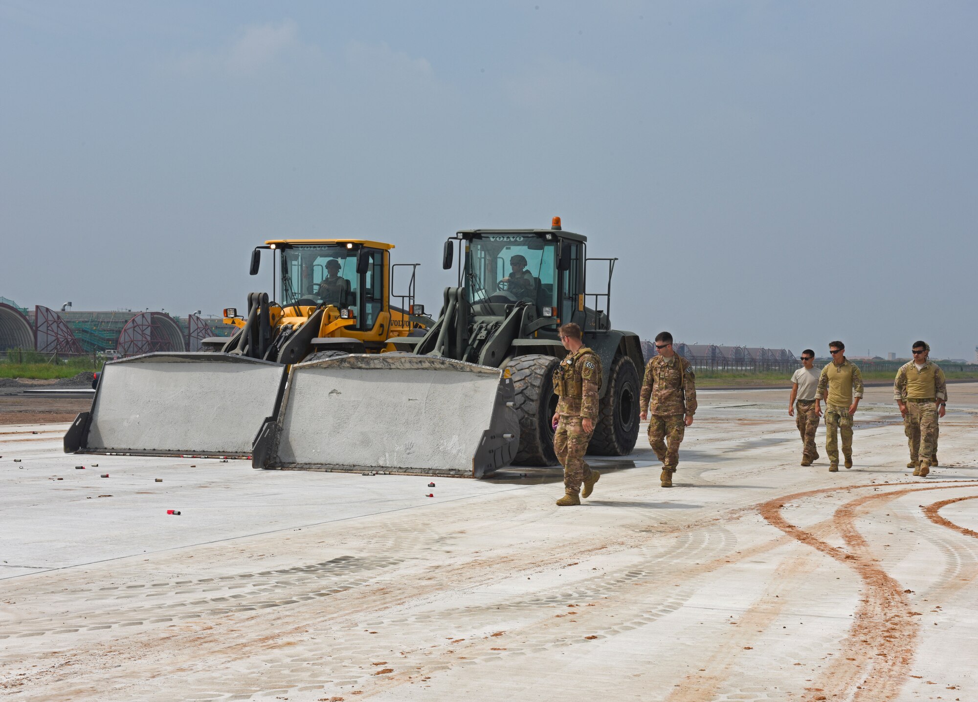 Members of the 8th Civil Engineer Squadron Explosive Ordnance Disposal unit conduct ordnance disposal training at Kunsan Air Base, Republic of Korea, Aug. 22, 2019. The 8th CES EOD unit partnered with the Republic of Korea Air Force’s 38th Fighter Group EOD unit to conduct joint ordnance disposal training, share response procedures and focus on enhancing mission capabilities. (U.S. Air Force photo by Staff Sgt. Mackenzie Mendez)