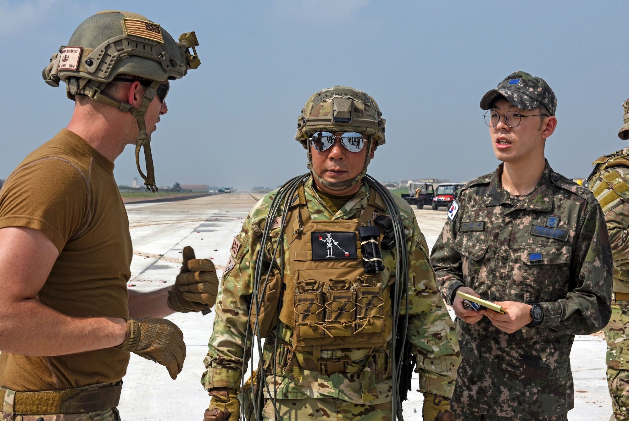 Airmen from the 8th Civil Engineer Squadron Explosive Ordnance Disposal unit conduct joint training with 38th Fighter Group EOD unit at Kunsan Air Base, Republic of Korea, Aug. 22, 2019. The joint training focused on procedures and techniques of disposing of unexploded ordnance in various environments. (U.S. Air Force photo by Staff Sgt. Mackenzie Mendez)