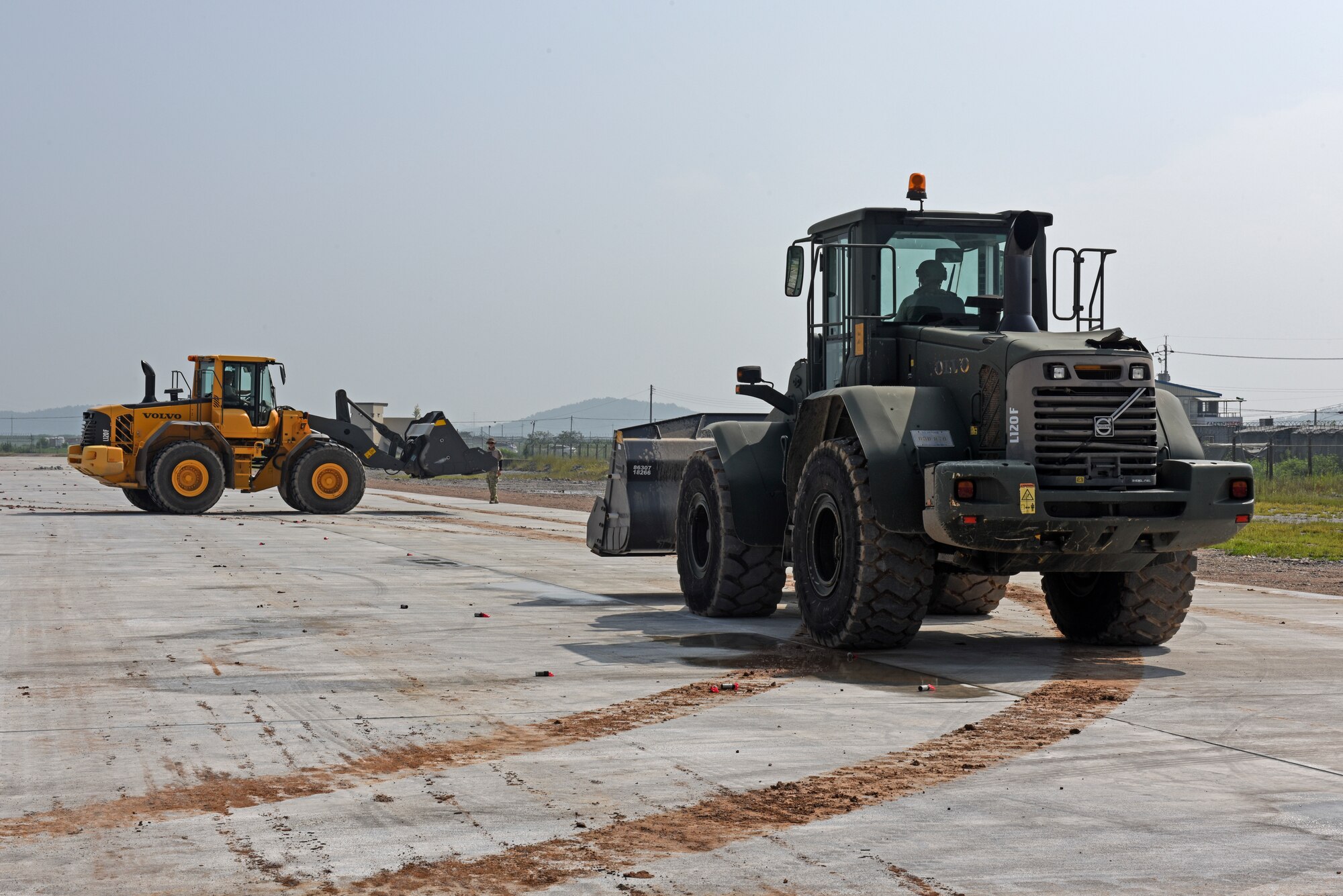 Airmen from the 8th Civil Engineer Squadron Explosive Ordnance Disposal unit conduct ordnance disposal training at Kunsan Air Base, Republic of Korea, Aug. 22, 2019. The 8th CES EOD unit partnered with the Republic of Korea Air Force’s 38th Fighter Group EOD unit to conduct joint ordnance disposal training, share response procedures and focus on enhancing mission capabilities. (U.S. Air Force photo by Staff Sgt. Mackenzie Mendez)