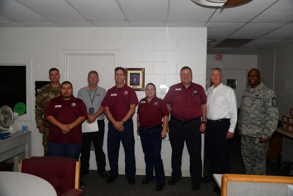 Ken Simon, the 47th Maintenance Directorate chief contracting office representative, accepts the “XLer of the week” award from Col. Todd Dyer, the 47th Flying Training Wing vice commander, and Chief Master Sgt. Ronald Harper, the 47 Mission Support Group superintendent on Aug. 29, 2019 at Laughlin Air Force Base, Texas. The “XLer of the Week” award, presented by Col. Todd Dyer, the 47th Flying Training Wing vice commander, and Chief Master Sgt. Ronald Harper, the 47 Mission Support Group superintendent, is given to those who consistently make outstanding contributions to their unit and the Laughlin mission. (U.S. Air Force photo by Senior Airman John A. Crawford)