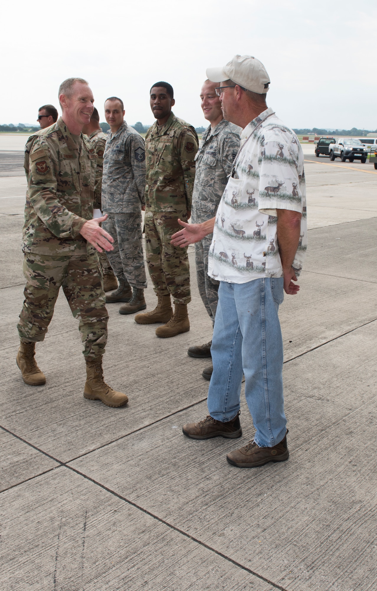 Major General James Dawkins Jr., Eighth Air Force commander, greets Michael Beaumeister, Air Force engineering and technical services representative assigned to Whiteman Air Force Base Missouri, on August 27, 2019, at Royal Air Force Fairford, England. Members of Team Whiteman, along with along strategic partners have deployed as part of a Bomber Task Force to the European Command area of operations to conduct theater integration and flying training. (U.S. Air Force photo by Staff Sgt. Kayla White)
