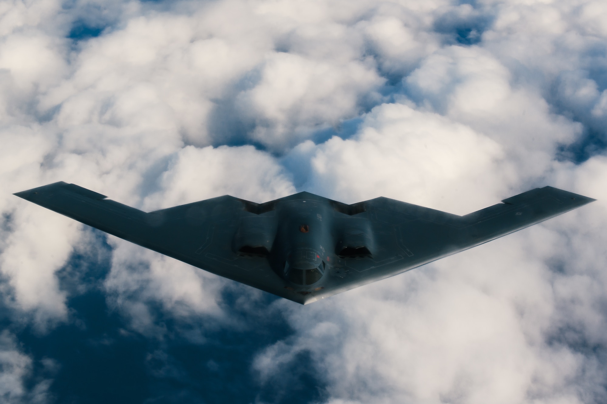 A U.S. Air Force 509th Bomb Wing B-2 Spirit approaches a 351st Aerial Refueling Squadron KC-135 Stratotanker during the Bomber Task Force training exercise over England, Aug. 29, 2019.