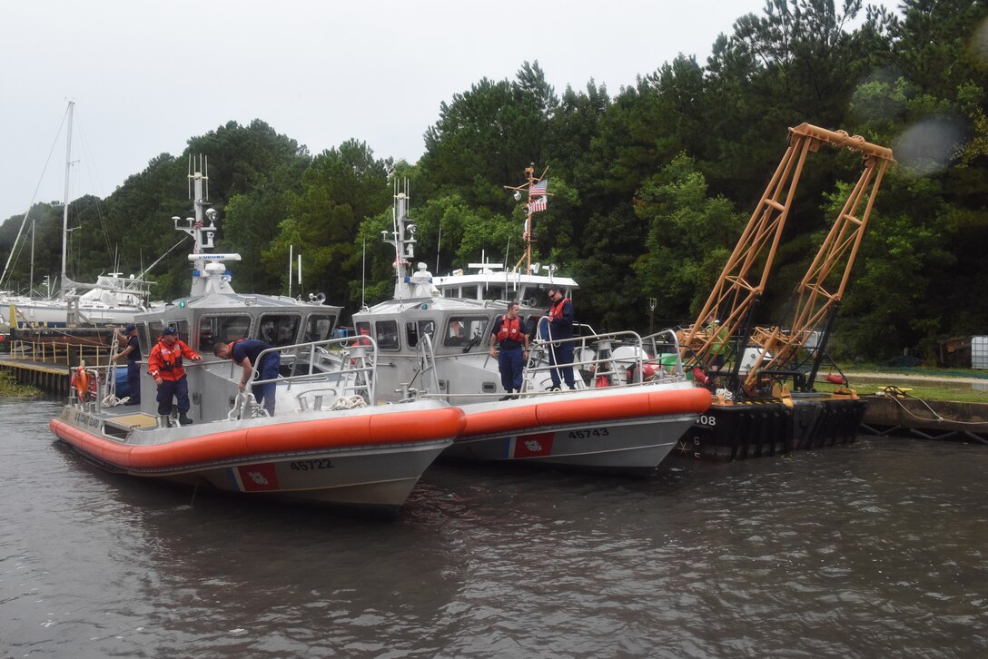 Crewmembers from Coast Guard Stations Charleston and Georgetown secure 45-foot response boats during Hurricane Dorian preparations in Charleston, South Carolina, Sept. 4, 2019.