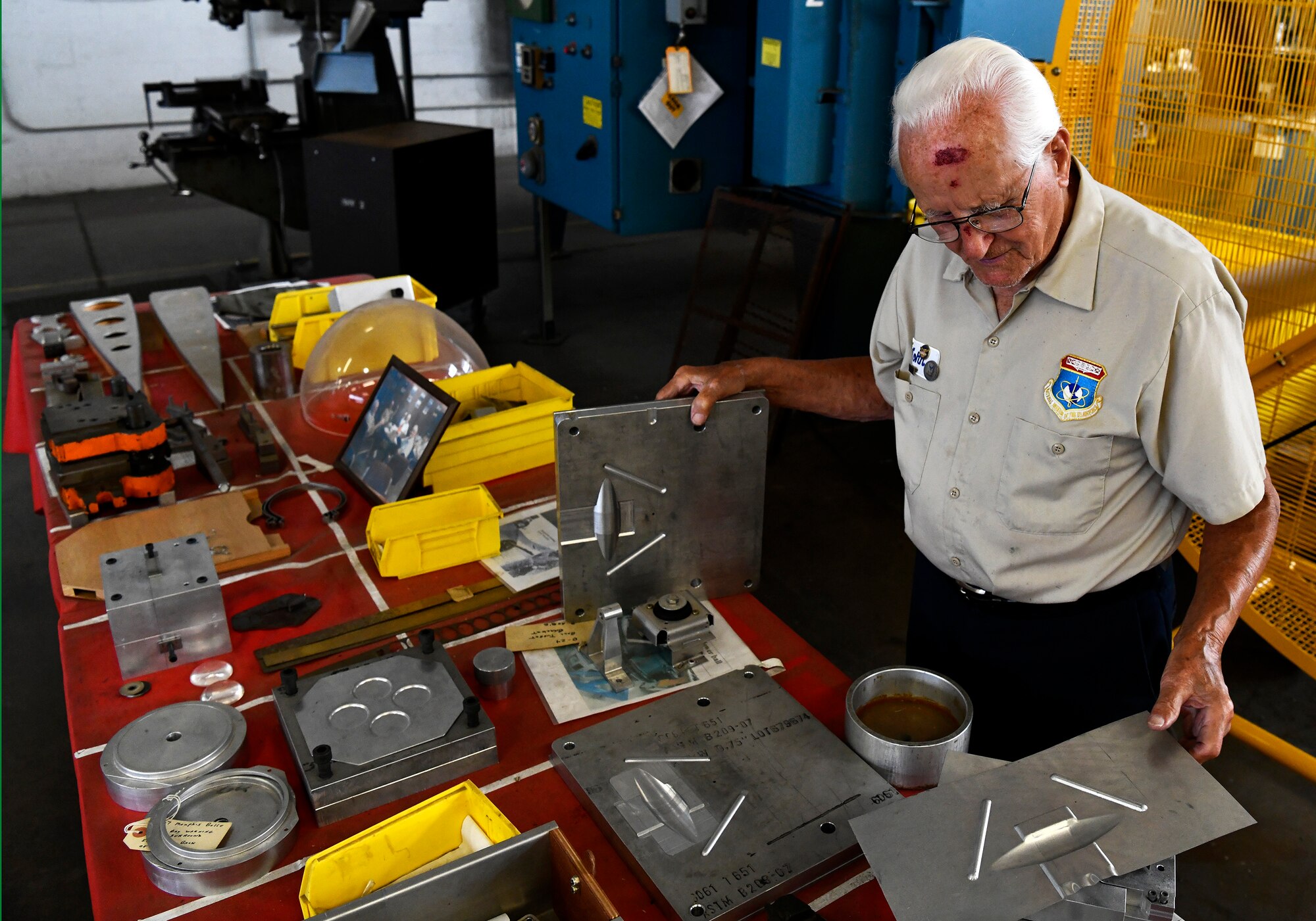 John Rumpf works to restore pieces of aircraft to be exhibited for the National Museum of the United States Air Force at Wright-Patterson Air Force Base, August 13 2019.  (U.S. Air Force photo / Darrius A. Parker)