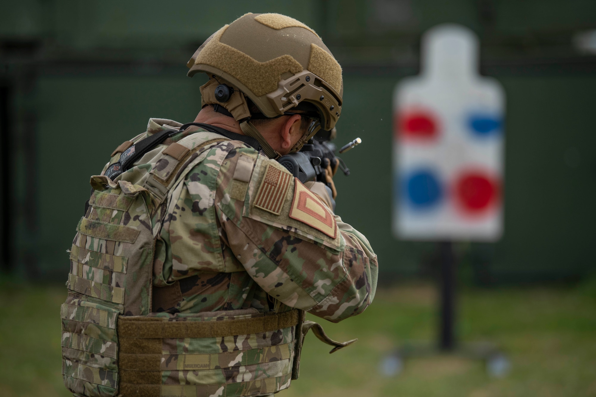 Col. Troy Pananon, 100th Air Refueling Wing commander, shoots an M4 Carbine during shoot, move and communicate training with Airmen from the 100th Security Forces Squadron at RAF Mildenhall, England, Aug. 30, 2019. Airmen from 100th SFS are RAF Mildenhall’s first line of defense against any adversary and are highly trained in law enforcement and they are combat arms specialist prepared to protect and serve their fellow Airmen around-the-clock. They have similar responsibilities as civilian officers, including responding to emergencies, directing traffic and investigating crimes on base. (U.S. Air Force photo by Senior Airman Luke Milano)