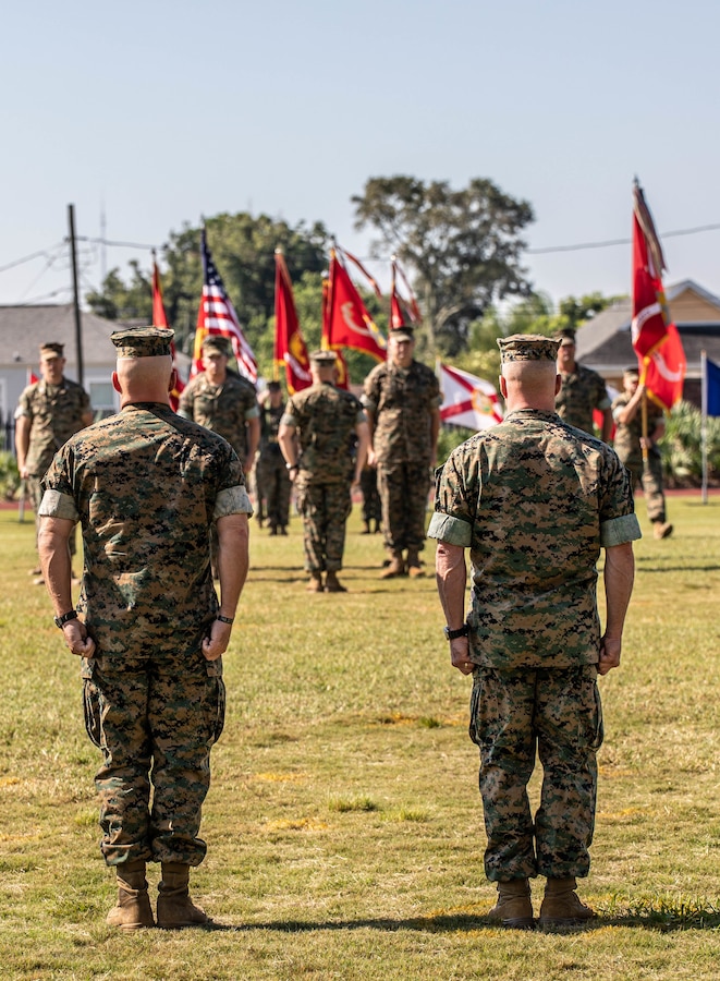 U.S. Marine Corps Brig. Gen. Michael S. Martin, outgoing commander of Marine Forces Reserve and Marine Forces North, and Lt. Gen David G. Bellon prepare to pass the colors during a change of command ceremony at Marine Corps Support Facility New Orleans, Sept. 4, 2019.  (U.S. Marine Corps photo by Pfc. Leslie Alcaraz)