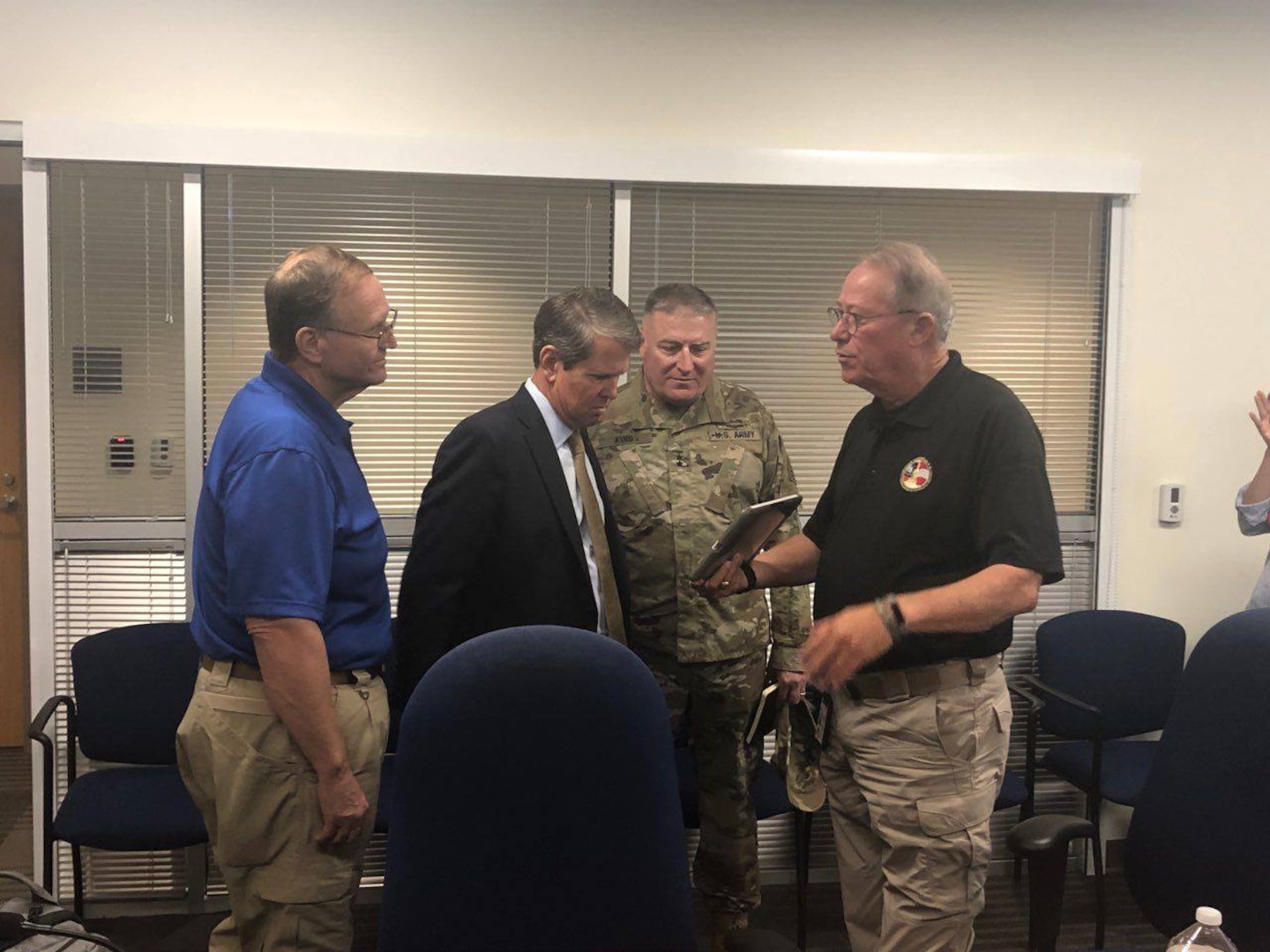 U.S. Army North/JFLCC’s Task Force 51 Commander Maj. Gen. John King listens as Georgia emergency management leaders Thomas Moore (right) and Homer Bryson (left) brief Georgia Gov. Brian Kemp (center) Sept. 1. Leaders from TF-51, the ARNORTH forward command post, are on the ground in Florida and Georgia coordinating potential federal military response to Hurricane Dorian.