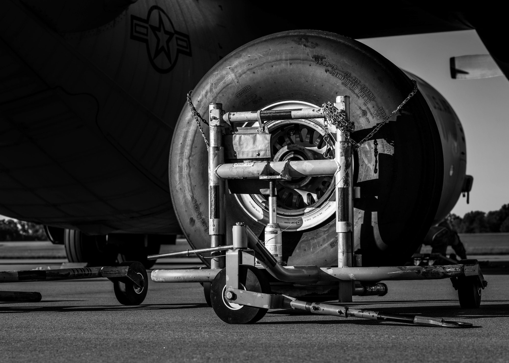 Members from the 910th Maintenance Group spent the morning changing a tire on an aircraft due to the normal wear and tear of routine takeoffs and landings.