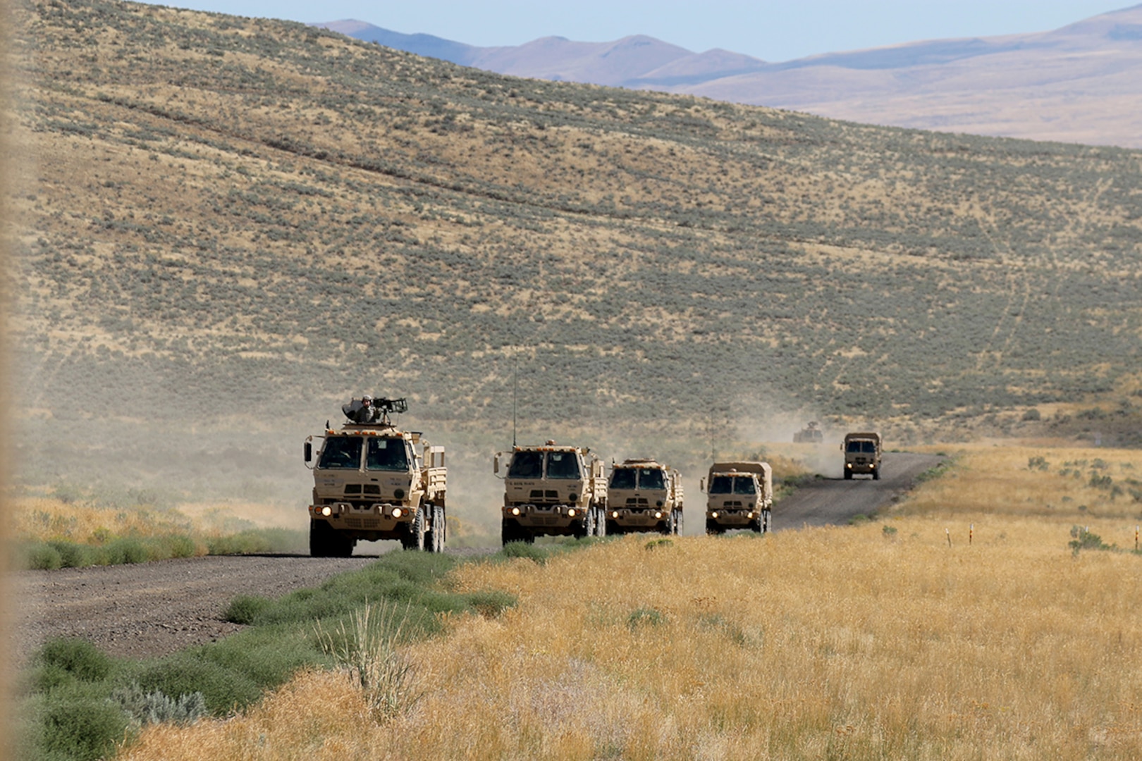 Illinois Army National Guard Soldiers from the 1844th Transportation Company convoy to their IED lane training as part of Rising Thunder 2019