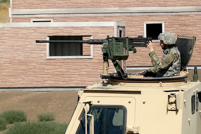 Cpl. Victoria Burgess of the 1844th Transportation Company, Illinois Army National Guard, conducts IED lane training as part of Rising Thunder 2019 at Yakima Training Center in Yakima, Washington, August 30, 2019.