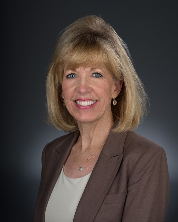 Sandy Person, Air Force-level civic leader, poses for formal photo at Travis Air Force Base, California. Civic leaders like Person engage with senior leadership to communicate mutual interest, challenges and concerns. (U.S. Air Force Photo by Heide Couch)