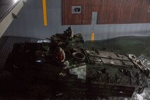 Philippine and U.S. Marines drive a Philippine assault amphibious vehicle onto the BRP Davao Del Sur (LD-602) during an AAV subject matter expert exchange in Subic Bay, Philippines, Aug. 31, 2019. The U.S. Marine Corps has partnered with the Philippine Marine Corps for the last eight years to develop skill sets and policies to enable the Philippine Navy and Marine Corps to conduct amphibious operations. This SMEE was a milestone in these efforts, marking the first time that Philippine forces launched their AAVs from a Philippine Navy amphibious ship and transited from ship to shore. The U.S. Marines are from AAV Company, 4th Marine Regiment, 3rd Marine Division. (U.S. Marine Corps photos by Lance Cpl. Jacob Hancock)