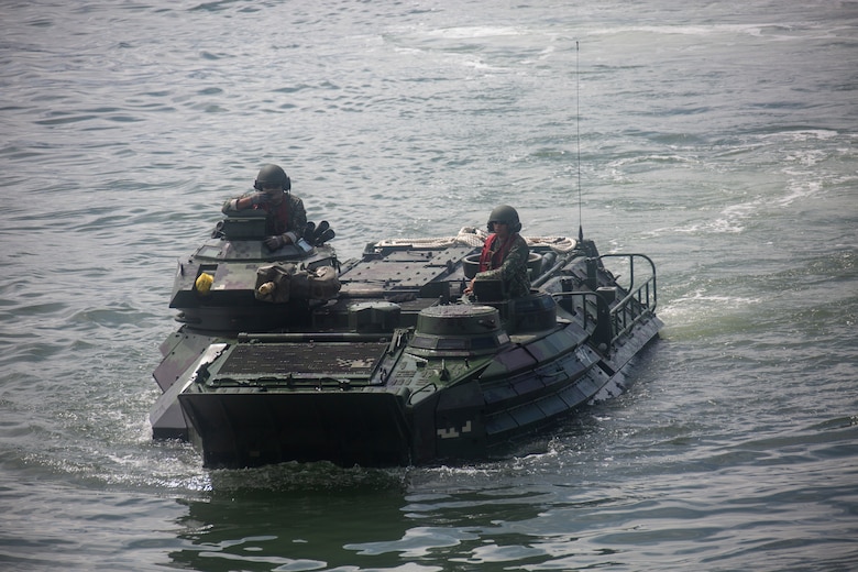 Philippine and U.S. Marines drive a Philippine assault amphibious vehicle onto the BRP Davao Del Sur (LD-602) during an AAV subject matter expert exchange in Subic Bay, Philippines, Aug. 31, 2019. The U.S. Marine Corps has partnered with the Philippine Marine Corps for the last eight years to develop skill sets and policies to enable the Philippine Navy and Marine Corps to conduct amphibious operations. This SMEE was a milestone in these efforts, marking the first time that Philippine forces launched their AAVs from a Philippine Navy amphibious ship and transited from ship to shore. The U.S. Marines are from AAV Company, 4th Marine Regiment, 3rd Marine Division. (U.S. Marine Corps photos by Lance Cpl. Jacob Hancock)