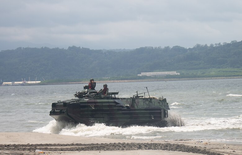 Philippine and U.S. Marines drive a Philippine assault amphibious vehicle onto the beach during an AAV subject matter expert exchange in Subic Bay, Philippines, Sept. 5, 2019. The U.S. Marine Corps has partnered with the Philippine Marine Corps for the last eight years to develop skill sets and policies to enable the Philippine Navy and Marine Corps to conduct amphibious operations. This SMEE was a milestone in these efforts, marking the first time that Philippine forces launched their AAVs from a Philippine Navy amphibious ship and transited from ship to shore. The U.S. Marines are from AAV Company, 4th Marine Regiment, 3rd Marine Division. (U.S. Marine Corps photos by Lance Cpl. Jacob Hancock)