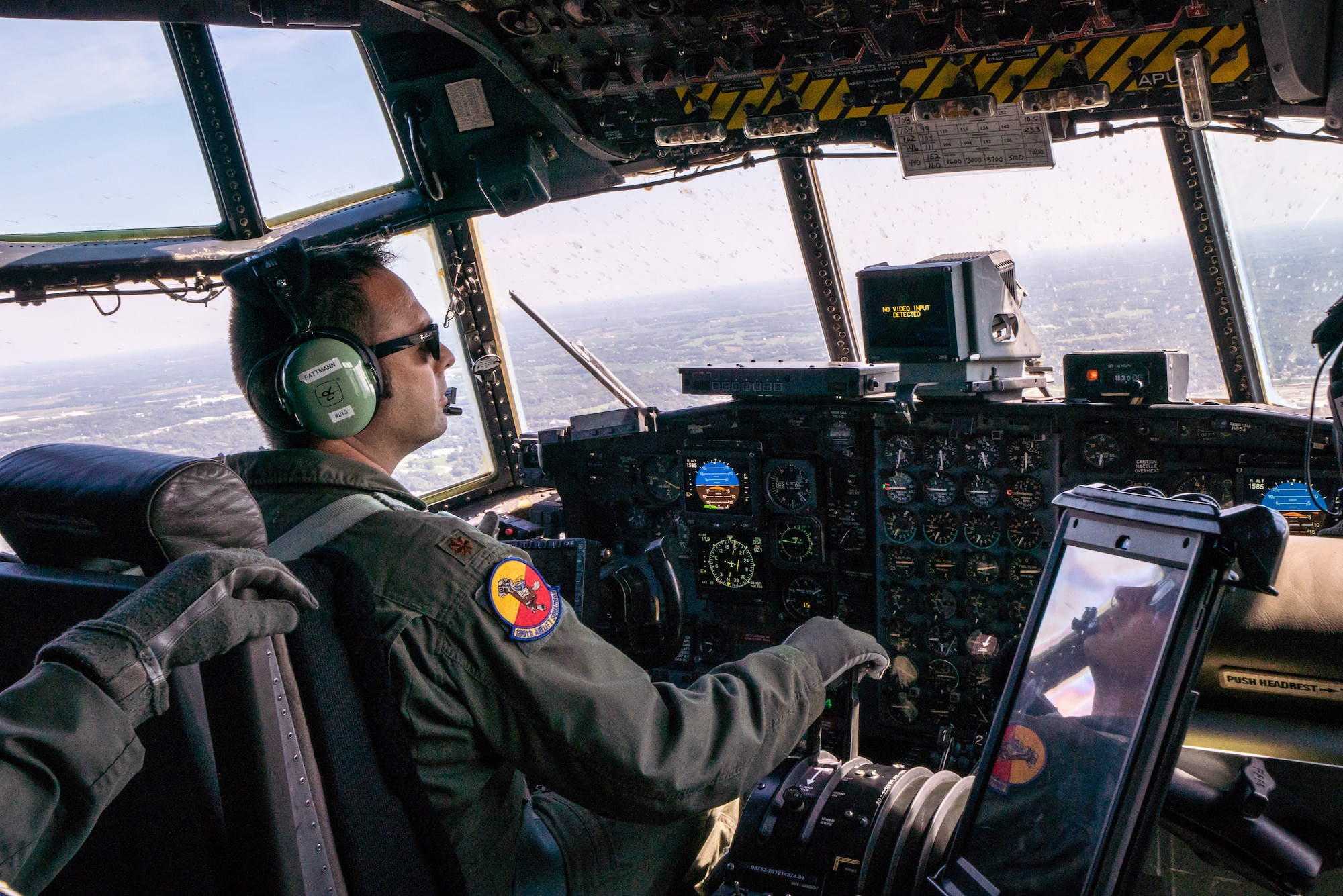 U.S. Air Force Maj. Ed Fattmann, a pilot assigned to the 180th Airlift Squadron, Missouri Air National Guard, takes his first flight as an aircraft commander with one eye, above St. Joseph, Missouri, Sept. 4, 2019. Fattman has been a pilot with the 180th AS since 2009, but was put on ‘duty not including flying’, status after losing sight in his right eye from a firework misfire in 2012. For his first flight back in military status, he flew with his original crew from his first deployment to Afghanistan in 2010. (U.S. Air National Guard photo by Tech. Sgt. Patrick Evenson)