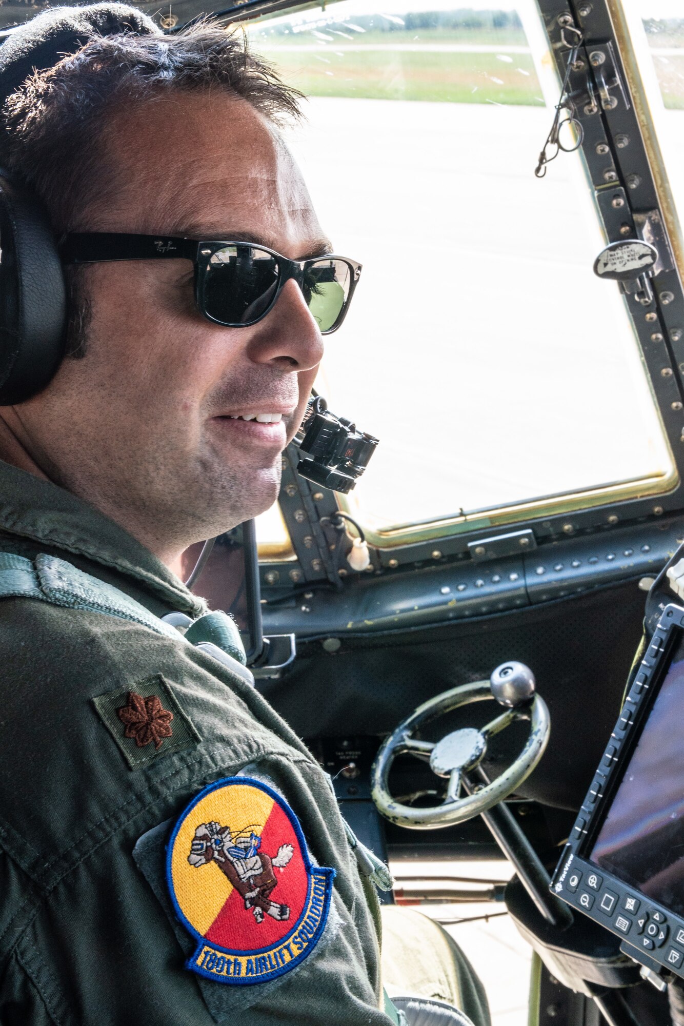 U.S. Air Force Maj. Ed Fattmann, a pilot assigned to the 180th Airlift Squadron, Missouri Air National Guard, takes his first flight as an aircraft commander with one eye, above St. Joseph, Missouri, Sept. 4, 2019. Fattman has been a pilot with the 180th AS since 2009, but was put on ‘duty not including flying’ status after losing sight in his right eye from a firework misfire in 2012. For his first flight back in military status, he flew with his original crew from his first deployment to Afghanistan in 2010. (U.S. Air National Guard photo by Tech. Sgt. Patrick Evenson)