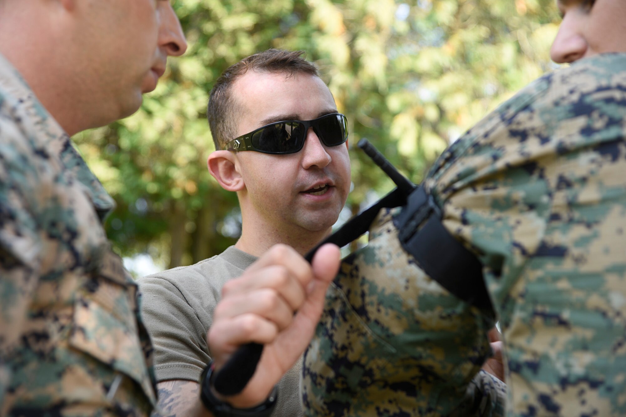 Spc. Frank Giglio, combat medic, 104th Area Support Medical Company, Maryland National Guard applies a tourniquet during a medical training exercise with the Armed Forces of Bosnia-Herzegovina, August 28, 2019, Banja Luka, Bosnia. The purpose of the training was to ensure members of the Armed Forces of Bosnia-Herzegovina are able to effectively respond to medical emergencies or casualties in combat situations. (U.S. Air National Guard photo by Staff Sgt. Enjoli Saunders)