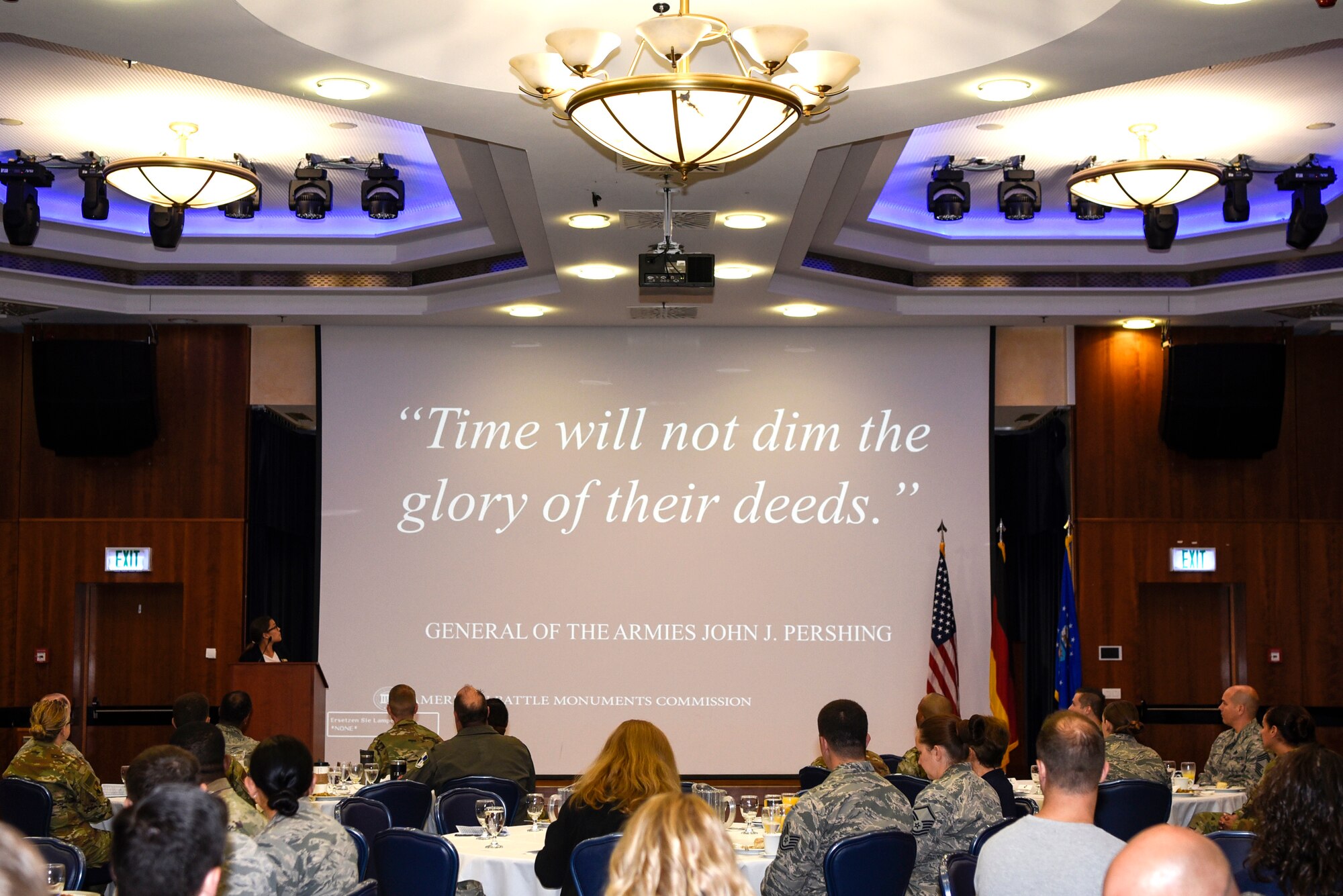 Jennifer Roman, Luxembourg American Cemetery and Memorial superintendent, left, speaks during the annual Prisoner-of-War and Missing-in-Action Recognition Ceremony at Spangdahlem Air Base, Germany, Sept. 6, 2019. Roman shared stories of captured and missing service members and spoke on the importance of their remembrance. (U.S. Air Force photo by Airman 1st Class Valerie Seelye)