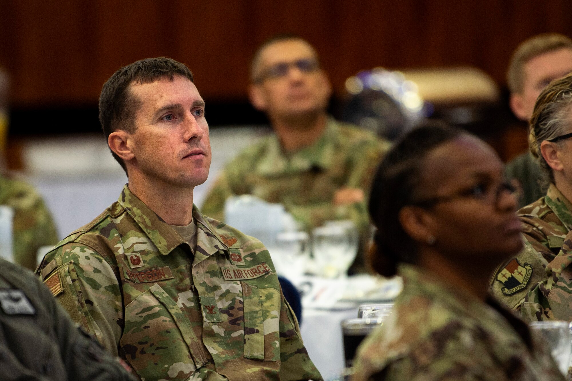 U.S. Air Force Col. David Epperson, 52nd Fighter Wing commander, left, attends the annual Prisoner-of-War and Missing-in-Action Recognition Ceremony at Spangdahlem Air Base, Germany, Sept. 6, 2019. The goal of the event was to remind Airmen of the brave men and women who have been captured or gone missing in action. The base honor guard performed a POW/MIA table ceremony and a guest speaker shared stories of missing service members. (U.S. Air Force photo by Airman 1st Class Valerie Seelye)