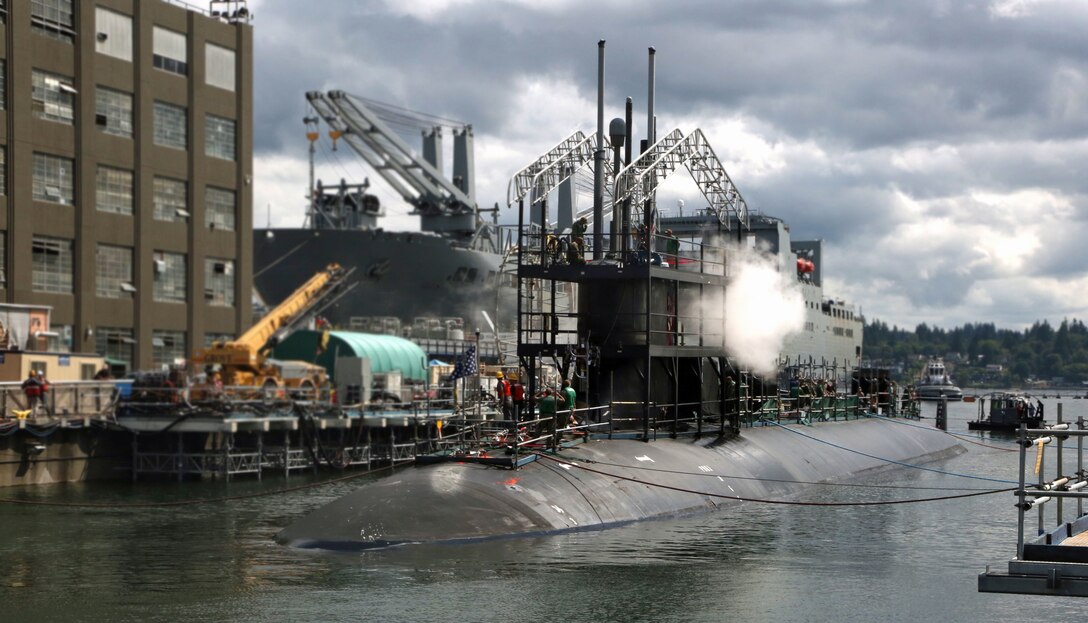 USS Connecticut (SSN 22) departs Puget Sound Naval Shipyard & Intermediate Maintenance Facility’s Dry Dock 4 Aug. 10.