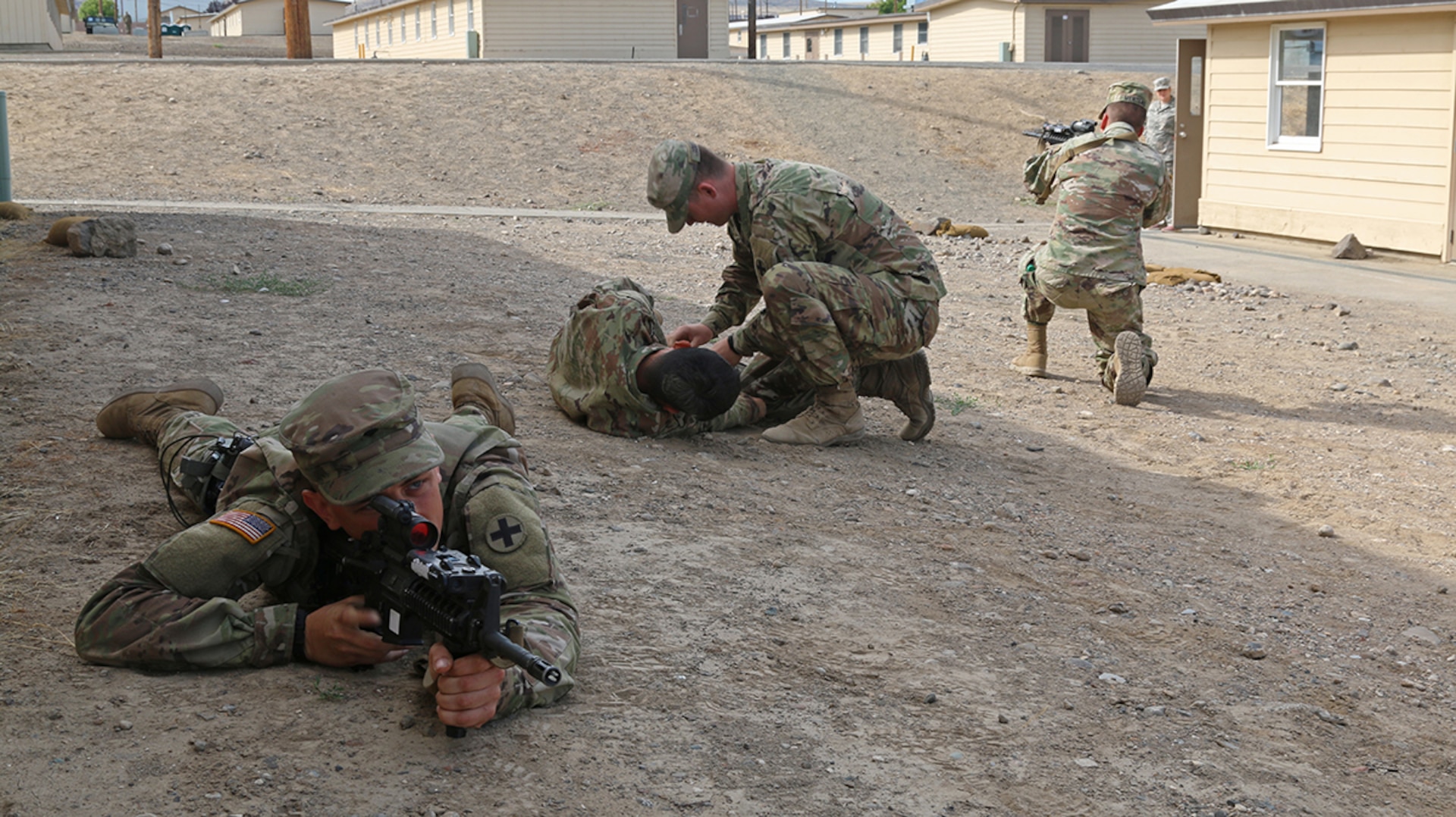 Soldiers of the 2nd Battalion, 130th Infantry Regiment, Illinois Army National Guard, participate in Combat Life Saver drills during Rising Thunder 19, Sept. 3, 2019 at the Yakima training Center in Yakima, Washington.