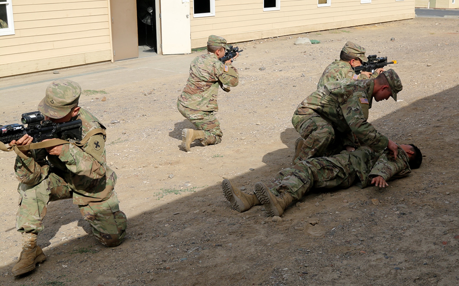Pfc. Taylor Reed (left), joined by fellow Guardsmen with the 2nd Battalion, 130th Infantry Regiment, Illinois Army National Guard, participate in Combat Life Saver drills during Rising Thunder 19, Sept. 3, 2019 at the Yakima training Center in Yakima, Washington.