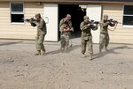 Soldiers of the 2nd Battalion, 130th Infantry Regiment, Illinois Army National Guard, participate in Combat Life Saver drills during Rising Thunder 19, Sept. 3, 2019 at the Yakima training Center in Yakima, Washington.