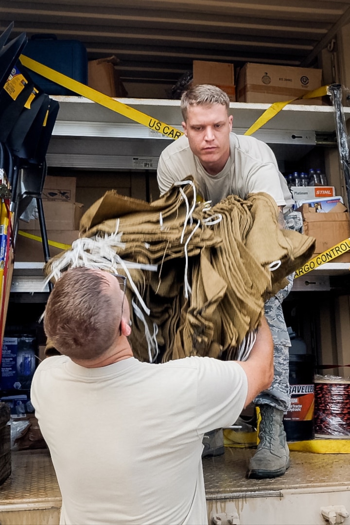 U.S. Air Force Tech. Sgt. Shane Kilgore, a heavy equipment operator with the 116th Civil Engineer Squadron, Georgia Air National Guard, removes supplies from a route clearance package during an inventory of the package at Fort Stewart, Ga., in preparation for Hurricane Dorian response Sept. 4, 2019.