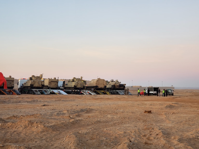 The 858th Movement Control Team oversees the loading of Task Force Spartan's equipment onto host nation trucks for transportation to their training destination during Eager Lion.