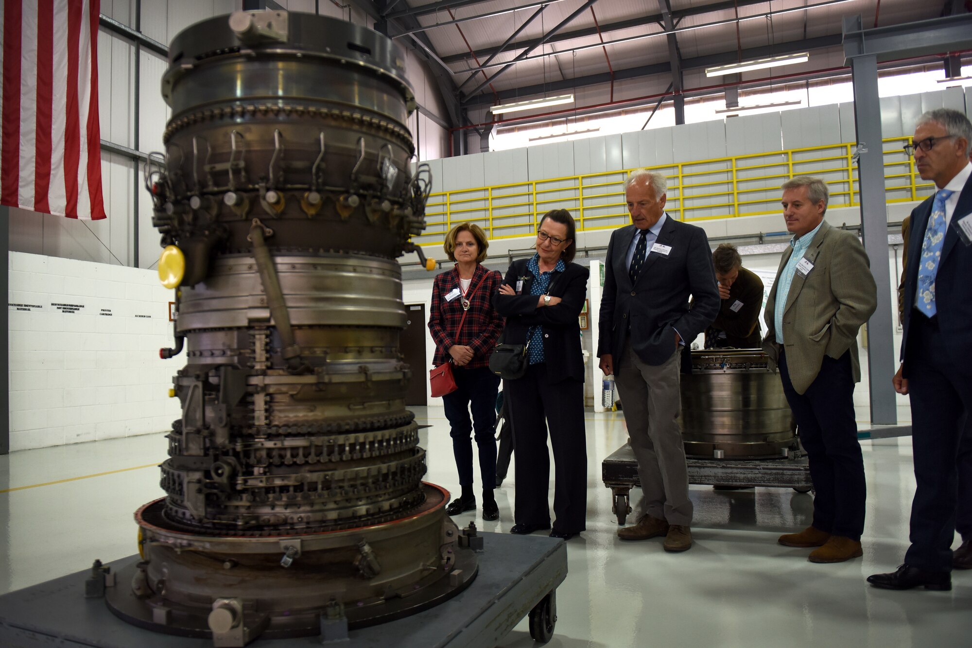 High Sheriffs look at an F-15 engine at Royal Air Force Lakenheath, England, Sept. 6, 2019. The Office of High Sheriff is an independent non-political Royal appointment for a single year. (U.S. Air Force photo by Airman 1st Class Madeline Herzog)